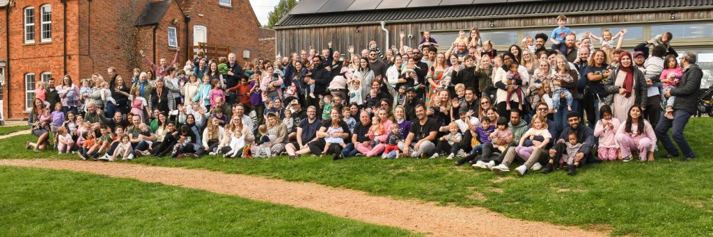 Parents and families having fun at an event for children with Down syndrome
