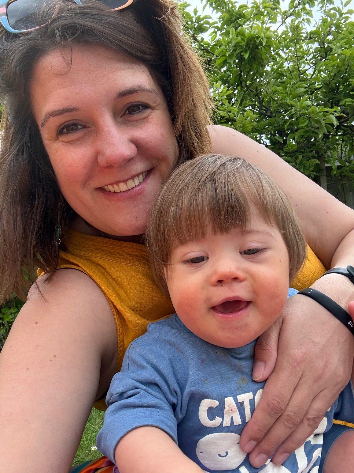 Rebecca Wilson, DSUK's Trustee is holding her son Colwyn who has down syndrome