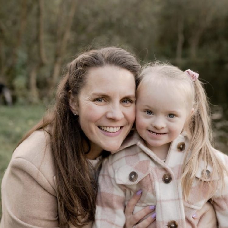 Mother and daughter posting for a picture