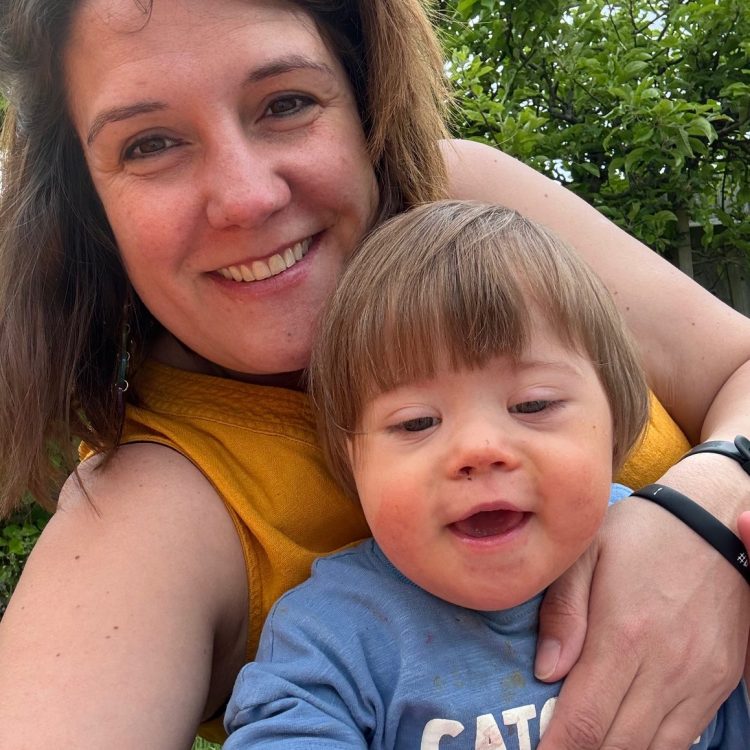Rebecca Wilson, DSUK's Trustee is holding her son Colwyn who has down syndrome